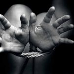 Hands tied with rope