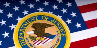 Department of Justice emblem on the American flag