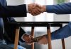 Handshake and money exchange