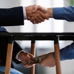 Handshake and money exchange