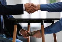 Handshake and money exchange