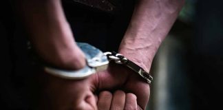 Hands in handcuffs