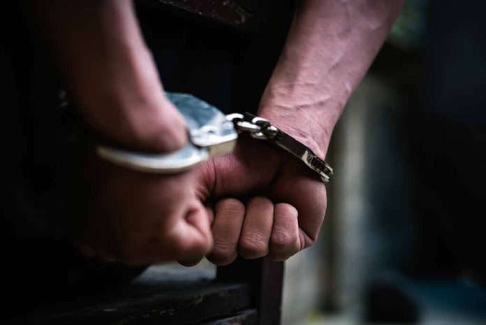 1338116366 featured image Hands in handcuffs