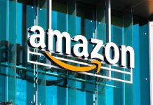 Amazon logo on a glass building facade