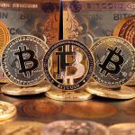 Bitcoins and Bitcoin-themed banknotes in various designs