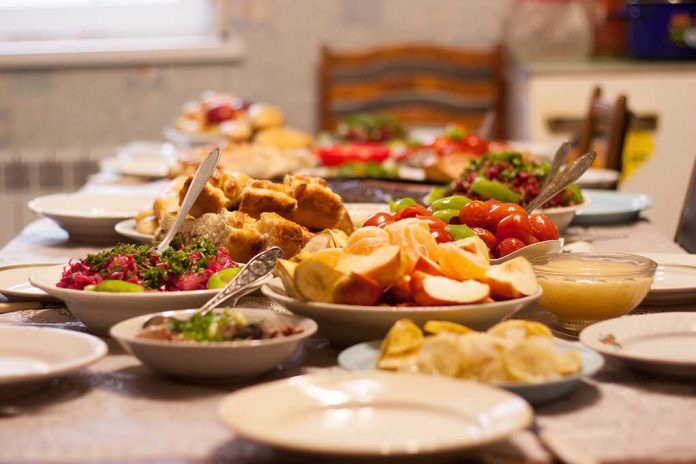 350705489 featured image Table set with various colorful dishes and fruits