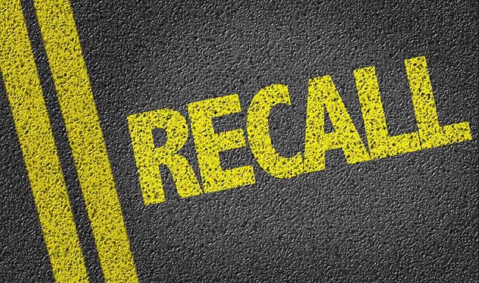 486784426 featured image Yellow RECALL text on asphalt background