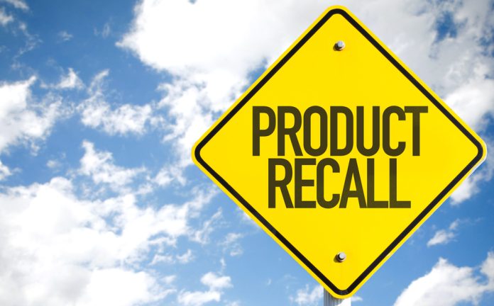 shutterstock_419918254.jpg featured image Yellow product recall sign against cloudy sky