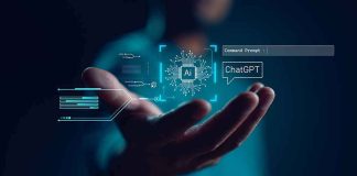 Hand holding digital AI and ChatGPT graphics