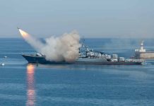 Warship firing missile in the sea