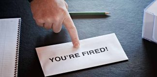 Envelope with YOU'RE FIRED! and pointing finger