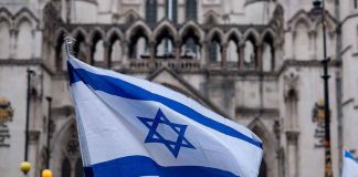 Israeli flag at a crowded outdoor event