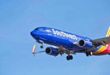 Southwest Airlines plane flying in blue sky