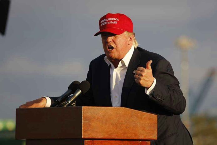 318051161 Person speaking at a podium wearing a red hat.