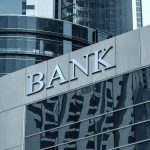 Bank building with reflective glass windows.