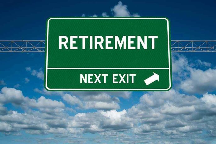 583127620 Green road sign reading retirement next exit sky background