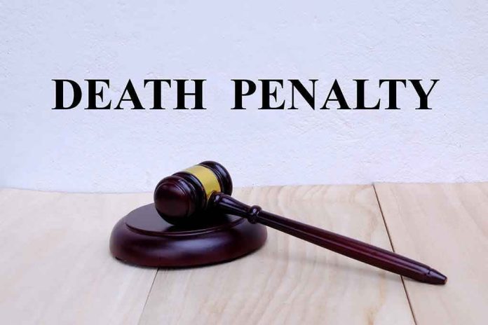 gavel-under-death-penalty-text-on-white-background death penalty