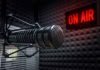 Radio microphone in studio with On Air sign