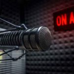 Radio microphone in studio with On Air sign