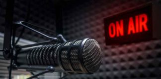 Radio microphone in studio with On Air sign