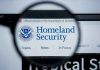 Magnifying glass showing Homeland Security website