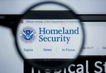 Magnifying glass showing Homeland Security website