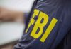 Jacket with FBI letters in yellow