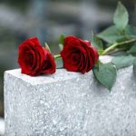 Authorities Uncover HORRIFYING Backyard Burial Two red roses on a grave