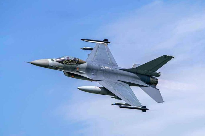 1629356173 Jet fighter flying through clear blue sky