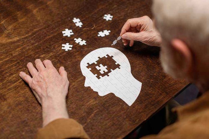 1776503864 Elderly person completing head shaped jigsaw puzzle