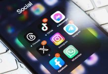 Bell Faces Intense Criticism During Awareness Month Smartphone showing social media app icons in a folder