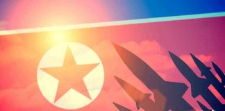 North Korean flag with missile silhouettes