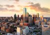 City skyline at sunset with modern skyscrapers