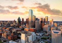 City skyline at sunset with modern skyscrapers