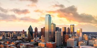 City skyline at sunset with modern skyscrapers