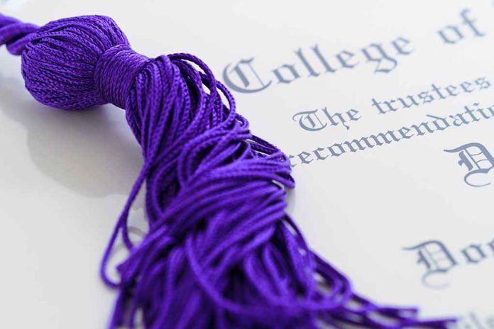shutterstock_82636375.jpg Close up of a purple graduation tassel next to a diploma