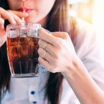 PepsiCo is Making These Major Changes… Person drinking soda from a glass mug