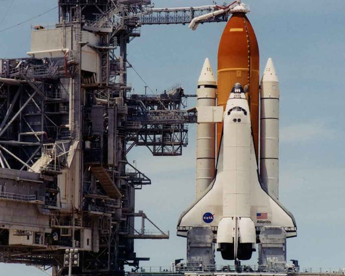 132394 Space shuttle on launch pad with support structure