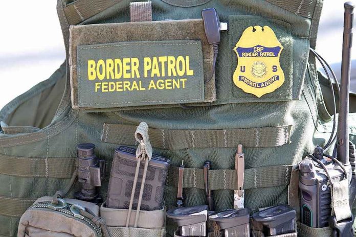 1646704639 Border Patrol vest with gear and communication equipment.