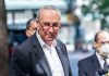 Democratic Party in TURMOIL Over Shutdown Deal Chuck Schumer posing for camera.