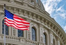 US flag in front of Capitol building