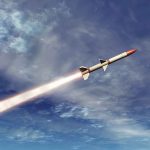 Game-Changing Mini-Missile Set to Disrupt Warfare A missile ascending into the sky with a trail of smoke