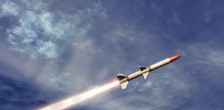 Game-Changing Mini-Missile Set to Disrupt Warfare A missile ascending into the sky with a trail of smoke