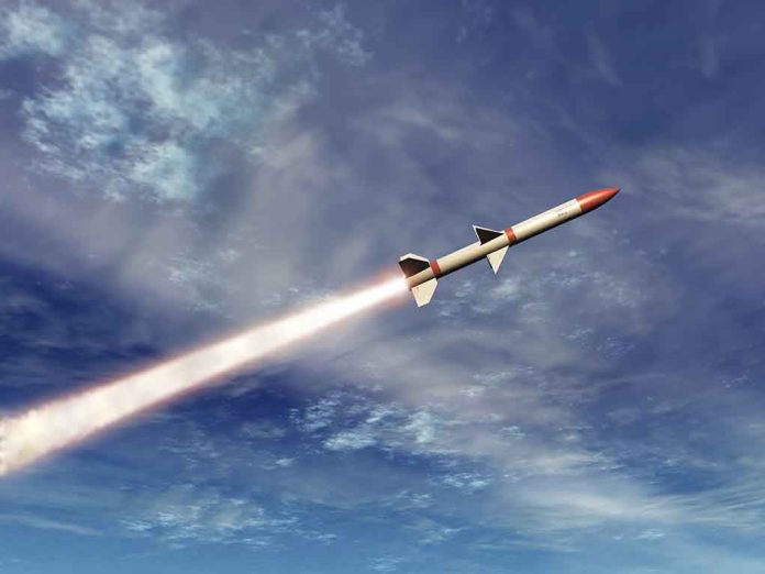 shutterstock_120507778.jpg A missile ascending into the sky with a trail of smoke