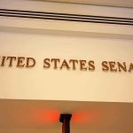 Nazi Tattoo Scandal UNRAVELS Senate Campaign Sign displaying United States Senate in a government building