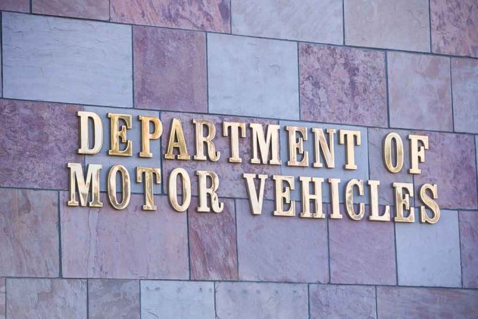shutterstock_1652982595.jpg Sign for the Department of Motor Vehicles on a stone wall