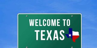 Welcome to Texas road sign with a Texas map