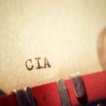 Close-up of a typewritten document labeled 'CIA'