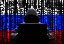 Luxury Cars HIJACKED—Owners Completely Helpless Hacker in hoodie with Russian flag background and code.