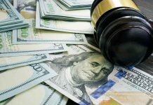 Farmers Caught in Tariff Crossfire! Gavel and hundred dollar bills on table.